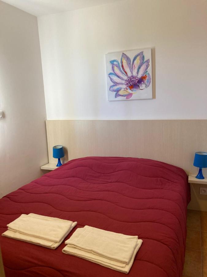 Punta Di Mare Aparthotel Linguizzetta Bagian luar foto